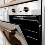 close-up-oven-with-golden-details